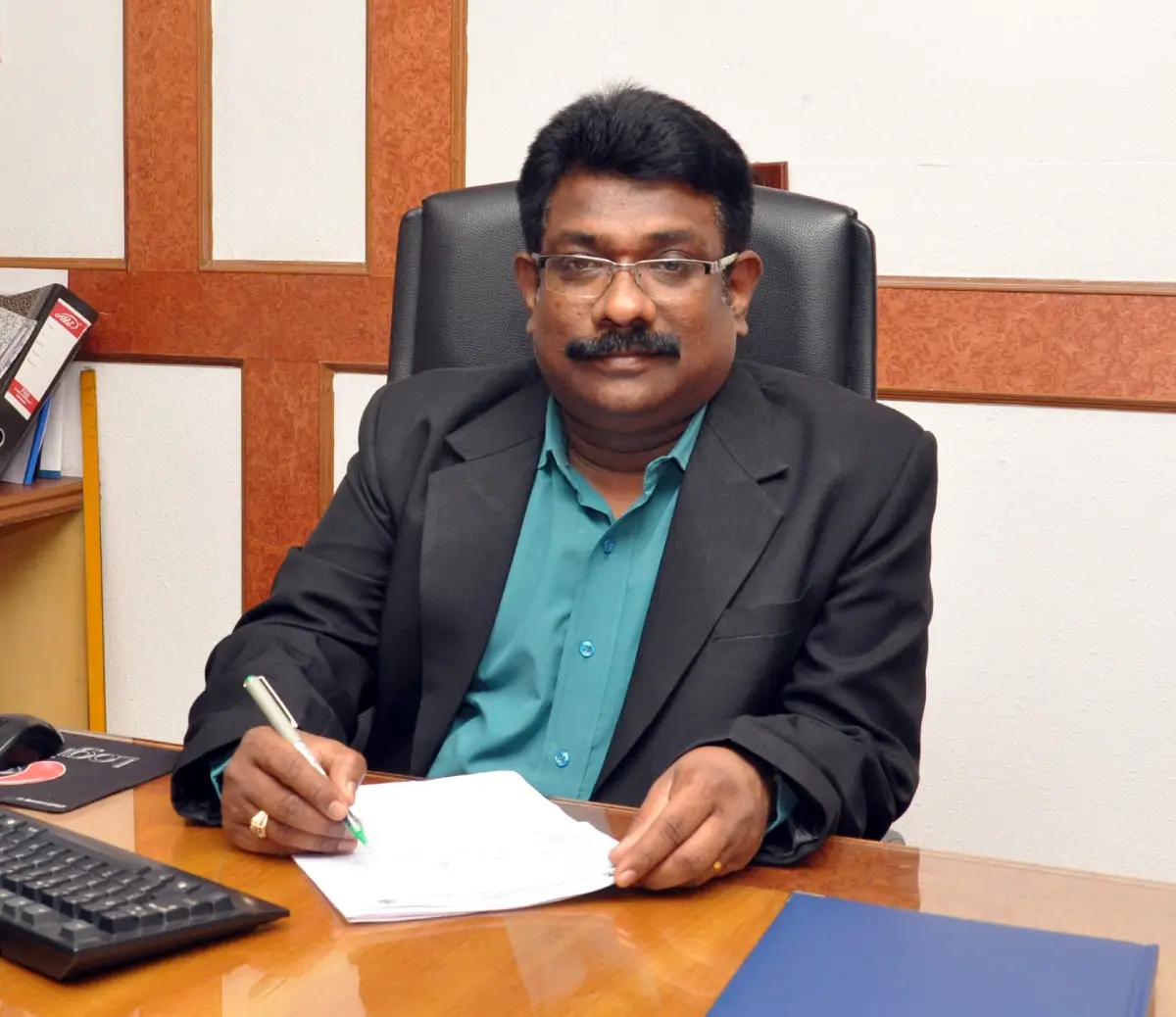Dr. M. Murugan